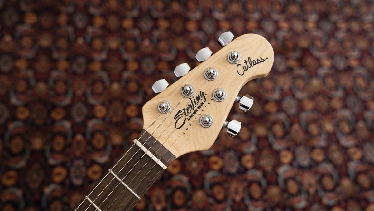 Electric guitar headstock with silver tuning pegs